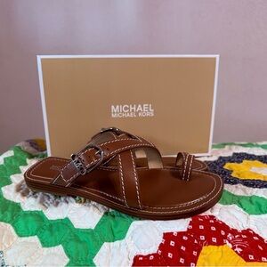 Brand new Michael Kors Ashton Flat Thong Leather sandals.